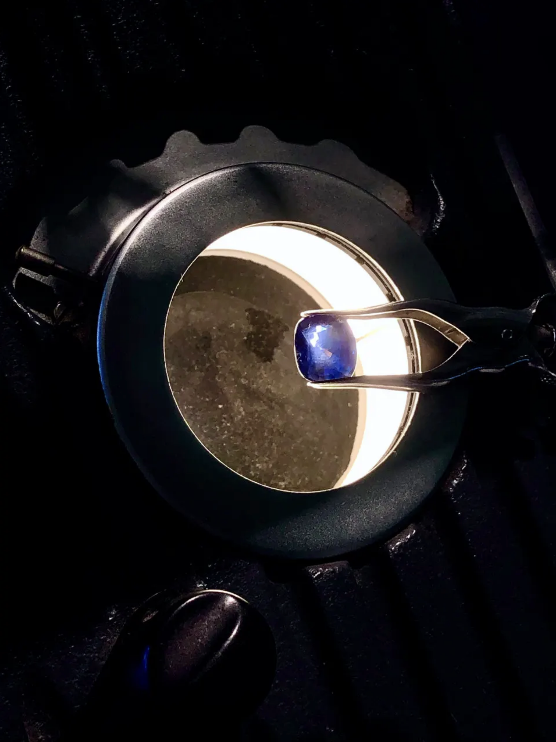 A loose Sapphire and inspected in a microscope 