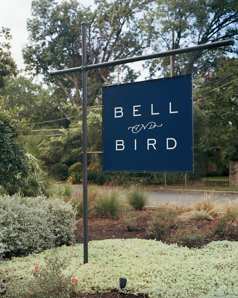 Photo of the Bell and Bird Store Sign in our front yard