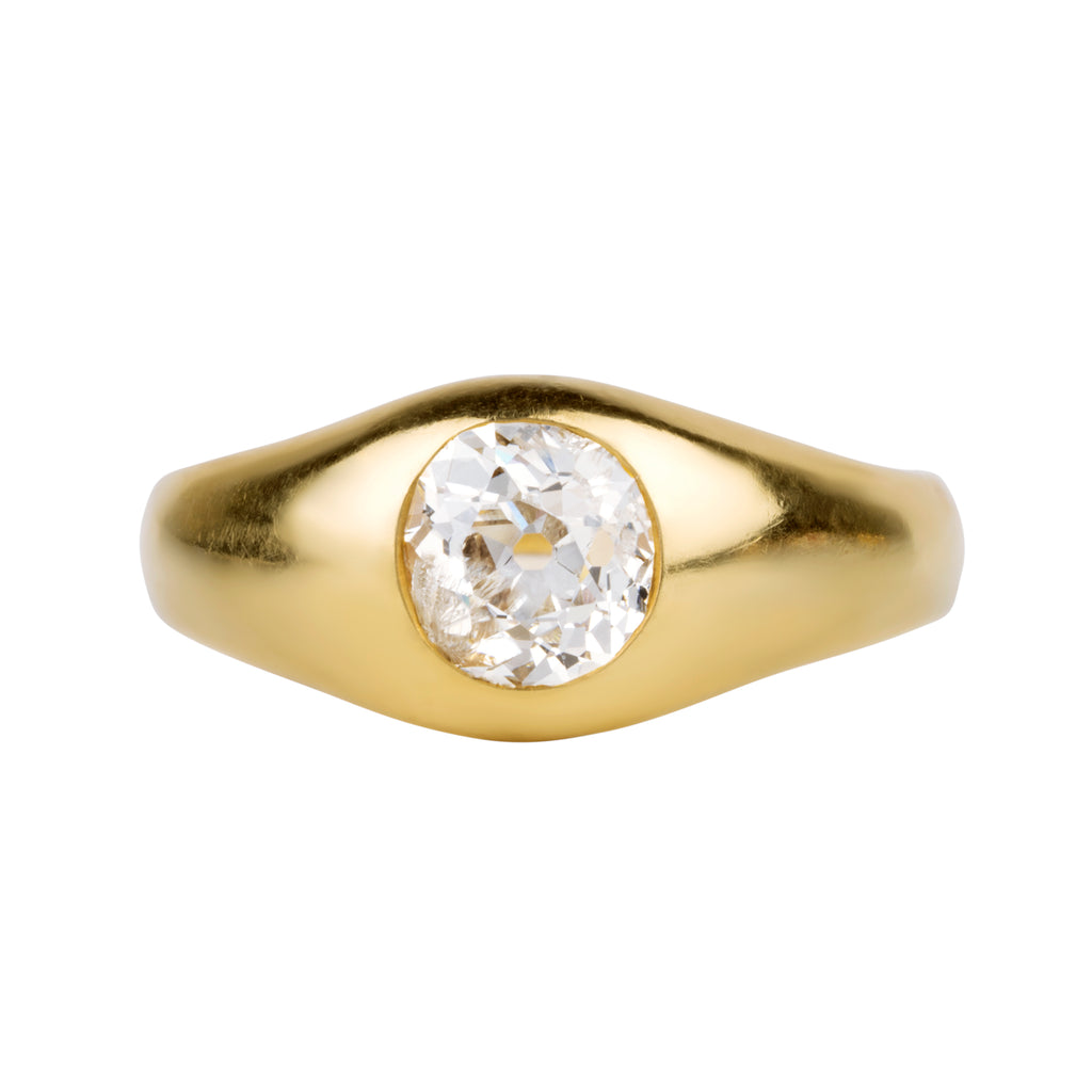 Victorian era flush set diamond solitaire ring. A lovely heavy 18k yellow gold with a single old mine cut diamond approx 1.25 cts, H color. American in origin. Circa 1890. Front view. 
