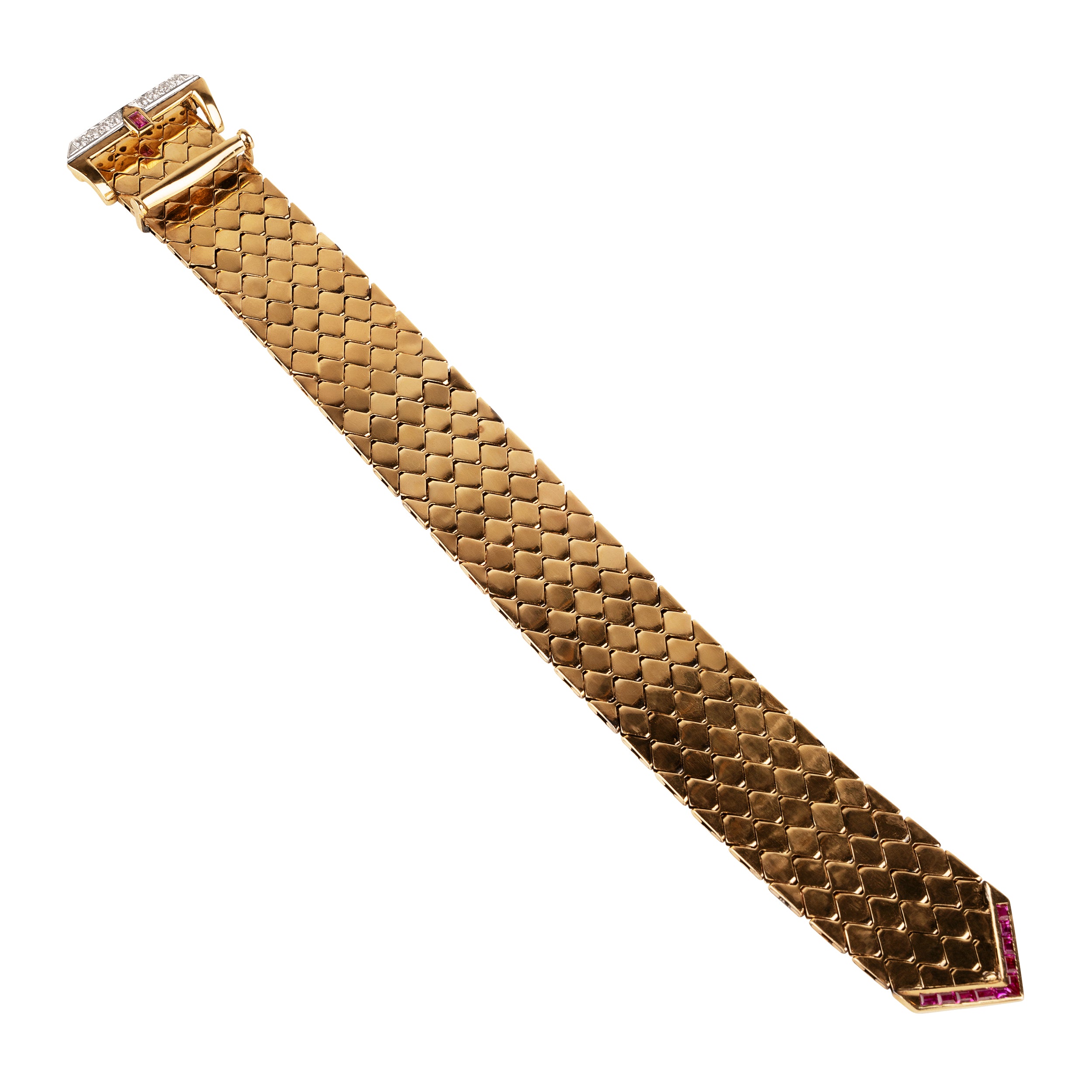 Mid-century gold buckle bracelet with rubies and diamonds in 18k gold. The functional buckle design has an adjustable fit. American in origin. Circa 1940. top view. 