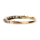 Victorian revival diamond bangle, in silver topped 15k gold. Eleven graduated old European cut diamonds, approximately 4 carats in total diamond weight. Found in Finland. European in origin. Circa 1920.&nbsp;