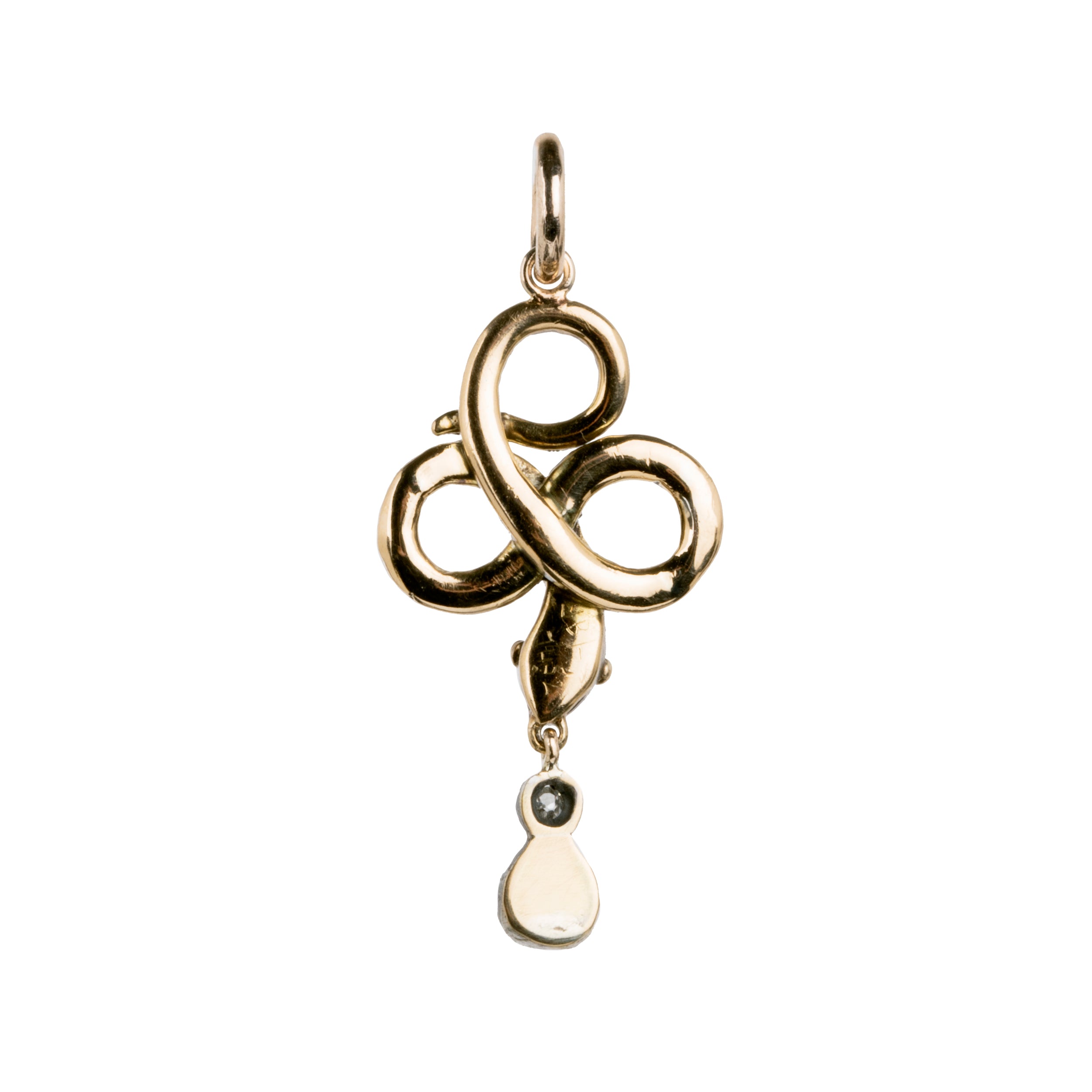 Rose cut diamonds are set&nbsp; in silver topped gold in the form of a snake. The snake is coiled into a trefoil design with a tear drop shaped diamond drop. The detail extends to two tiny ruby eyes. The piece appears to have been converted into a pendant from a brooch or stick pin. England, Circa 1820. Back side view. 