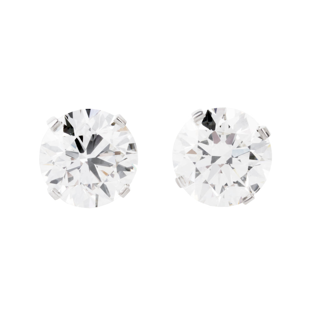 Classic round brilliant cut diamond earring studs. Handmade platinum four-tab prong settings with locking backs. Featuring two GIA certified diamonds, 2.01 carats J color and SI1 clarity and 2.01 I color and SI1 clarity. Over four carats in total weight. Front view of the diamond earrings. 