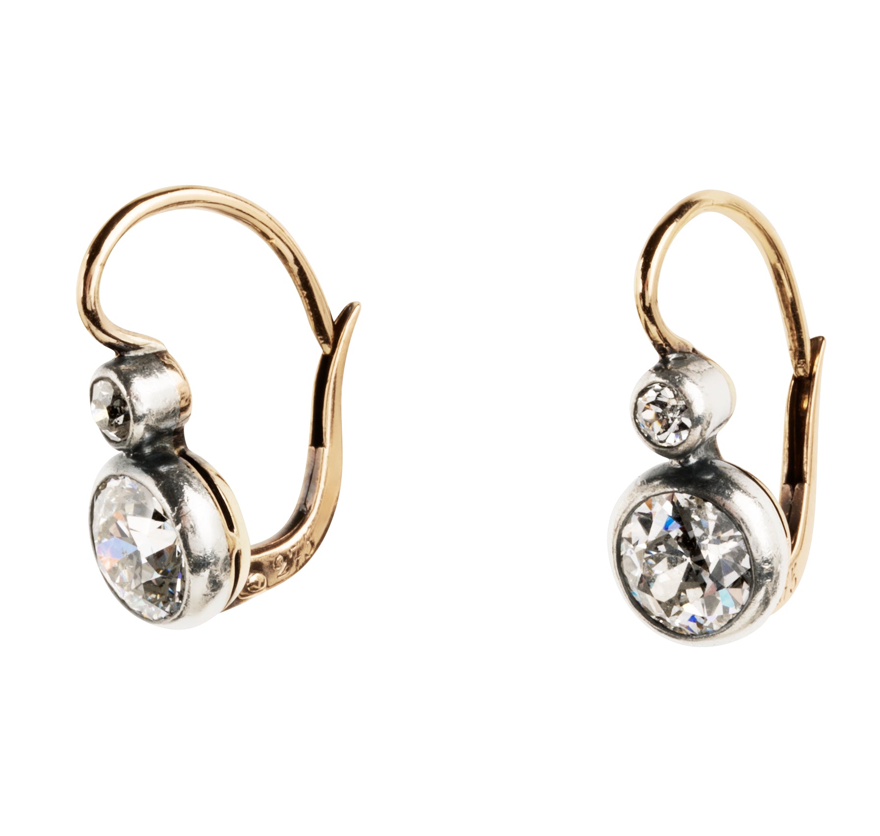 Antique old European cut diamond two-stone earrings. Set in bezel set Silver topped 14k gold. A hand engraved detail on each hook reads "2.75" which is the estimated total diamond weight.The stones are estimated to be J-L in color and I1 in clarity. Side view. 