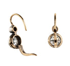 Antique old European cut diamond two-stone earrings. Set in bezel set Silver topped 14k gold. A hand engraved detail on each hook reads "2.75" which is the estimated total diamond weight.The stones are estimated to be J-L in color and I1 in clarity. Back view with the back hinges open to show how the hooks function. 