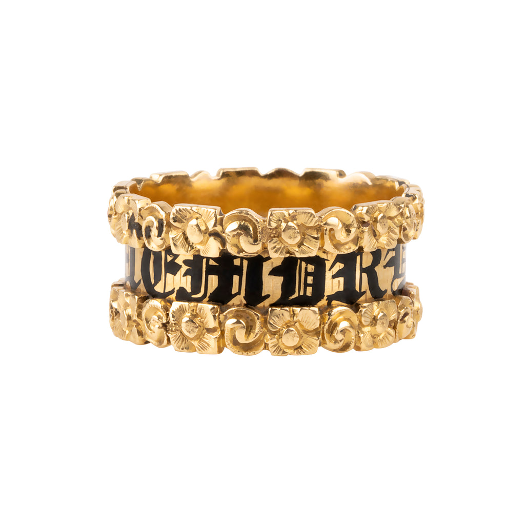 Early Victorian era wide mourning band, in 18k gold. Reads "In Memory Of" in black enamel with chased floral details. English in origin. London hallmarks. Circa 1814.