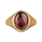 Victorian era garnet cabochon signet ring in 18k gold. Hand engraved "The Jubilee, LC&amp;E, Tabram, Married March 30, 1815." English in origin. Likely made in 1865 celebrating a 50th wedding anniversary. Front View.