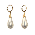 In the 18th century, glass pearl earrings were a popular alternative to natural pearls, and they commanded great prices. These imitation pearls were made by coating the interior of blown glass with a pearlescent ‘nacre’ derived from fish scales and gelatin. Earrings of the time reflected the Baroque and Rococo fashion, favoring long, dangling styles like girandole and pendant earrings.&nbsp; They were a staple in 18th-century jewelry, but their delicate nature makes them very rare today. England. Circa 1870