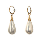 In the 18th century, glass pearl earrings were a popular alternative to natural pearls, and they commanded great prices. These imitation pearls were made by coating the interior of blown glass with a pearlescent ‘nacre’ derived from fish scales and gelatin. Earrings of the time reflected the Baroque and Rococo fashion, favoring long, dangling styles like girandole and pendant earrings.&nbsp; They were a staple in 18th-century jewelry, but their delicate nature makes them very rare today. England. Circa 1870