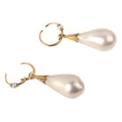 In the 18th century, glass pearl earrings were a popular alternative to natural pearls, and they commanded great prices. These imitation pearls were made by coating the interior of blown glass with a pearlescent ‘nacre’ derived from fish scales and gelatin. Earrings of the time reflected the Baroque and Rococo fashion, favoring long, dangling styles like girandole and pendant earrings.&nbsp; They were a staple in 18th-century jewelry, but their delicate nature makes them very rare today. England. Circa 1870