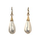 In the 18th century, glass pearl earrings were a popular alternative to natural pearls, and they commanded great prices. These imitation pearls were made by coating the interior of blown glass with a pearlescent ‘nacre’ derived from fish scales and gelatin. Earrings of the time reflected the Baroque and Rococo fashion, favoring long, dangling styles like girandole and pendant earrings.&nbsp; They were a staple in 18th-century jewelry, but their delicate nature makes them very rare today. England. Circa 1870