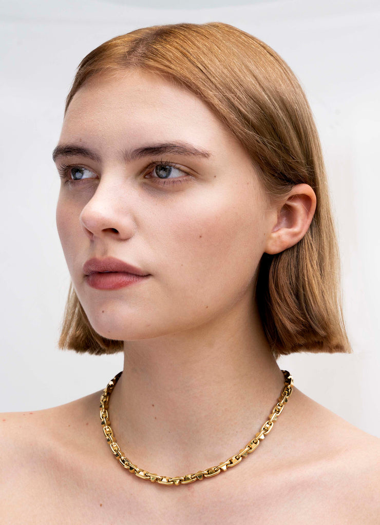 Bell & Bird Yellow Gold Hobnail Necklace. Handmade in 18k yellow gold. 17" in length. The necklace being modeled.