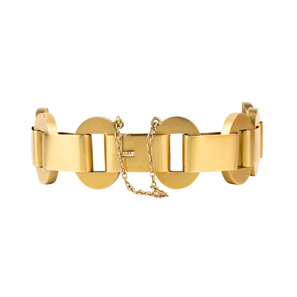 Victorian era gold chain bracelet with a bright bloomed finish in 18k yellow gold. Hollow links in a bold design form the chain. England. Circa 1880. Backside view. 