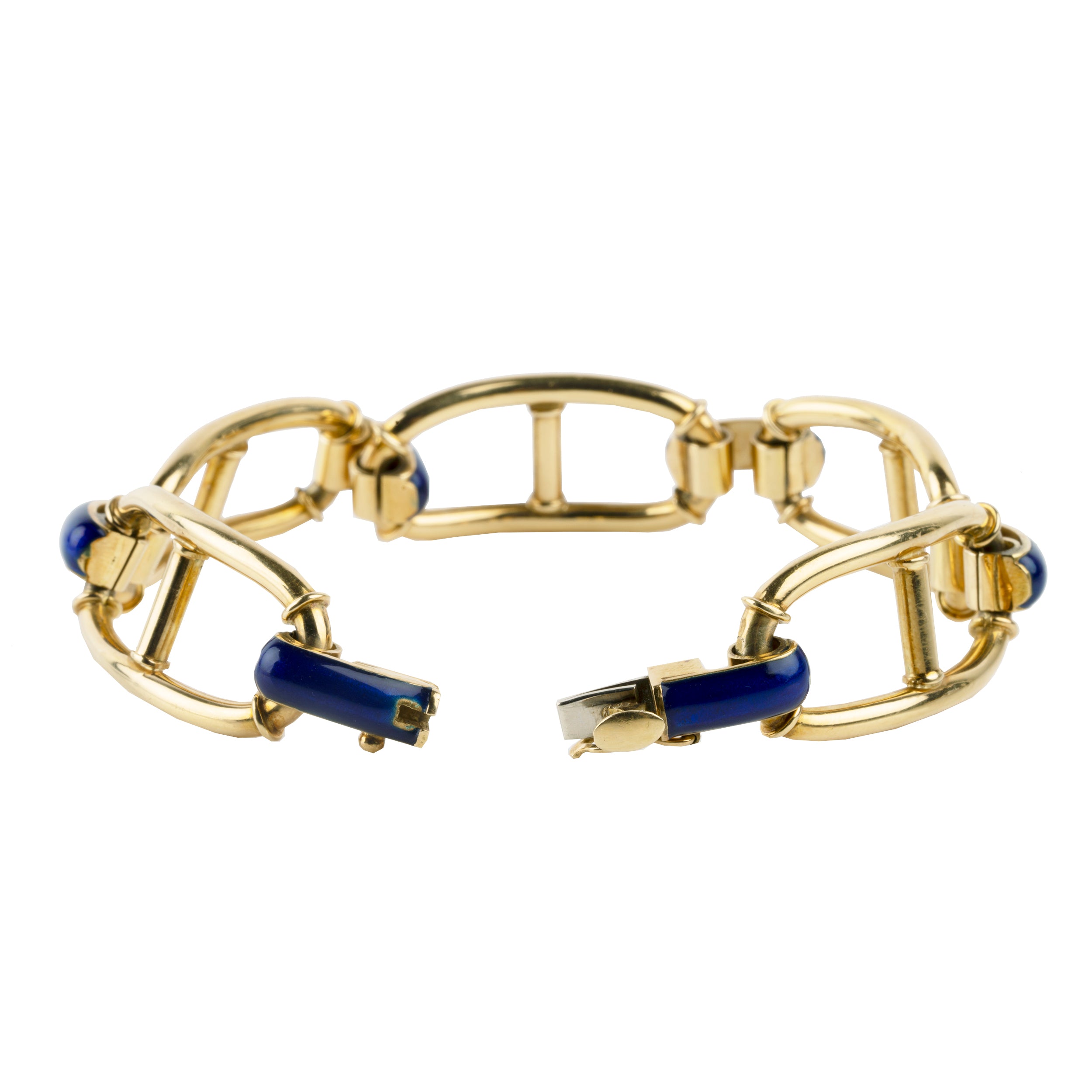 A nice anchor link bracelet with cobalt blue links between bright 18k yellow gold nautical chain links. Solid heavy links. Perfect for everyday wear. Circa 1960.