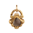 Early Victorian era turquoise padlock locket in 15k gold. It is in the form of a shell with Persian turquoise and a glazed compartment.&nbsp; English in origin. Circa 1840. Hanging on an antique 15k gold turquoise beaded ball chain.