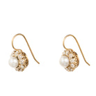 19th Century diamond and pearl cluster earrings. Once elements of a larger piece, later converted into earrings.Presumably Russian, found in Finland. Circa 1890.
