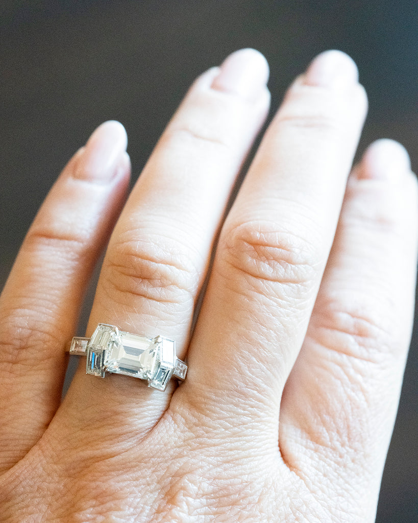 Platinum Diamond Baguette Ring being worn on a hand. 