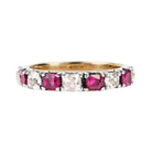 Georgian-inspired diamond and ruby ring, in silver topped with gold. Old mine cut diamonds and rubies set in a fishtail setting. English in origin. Circa 20th century. Front view. 