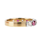 Georgian-inspired diamond and ruby ring, in silver topped with gold. Old mine cut diamonds and rubies set in a fishtail setting. English in origin. Circa 20th century. Side view. 