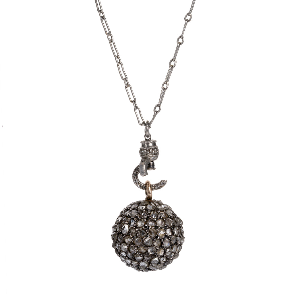 A rare Georgian-era diamond ball pendant is hanging on an early 20th century French platinum chain. Rose-cut diamonds are intricately pavé set in silver, gold, and platinum. The chain has French hallmarks and The ball is English in origin. Circa 1820. Close up of the claps open. 