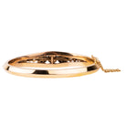 Approximately three carats of rose-cut diamonds are set in silver cut-away settings. The twenty diamonds flank a single natural pearl. The stones taper into a knife-edge detail in 18k rose gold. Continental Europe, circa 1860. Back view. 