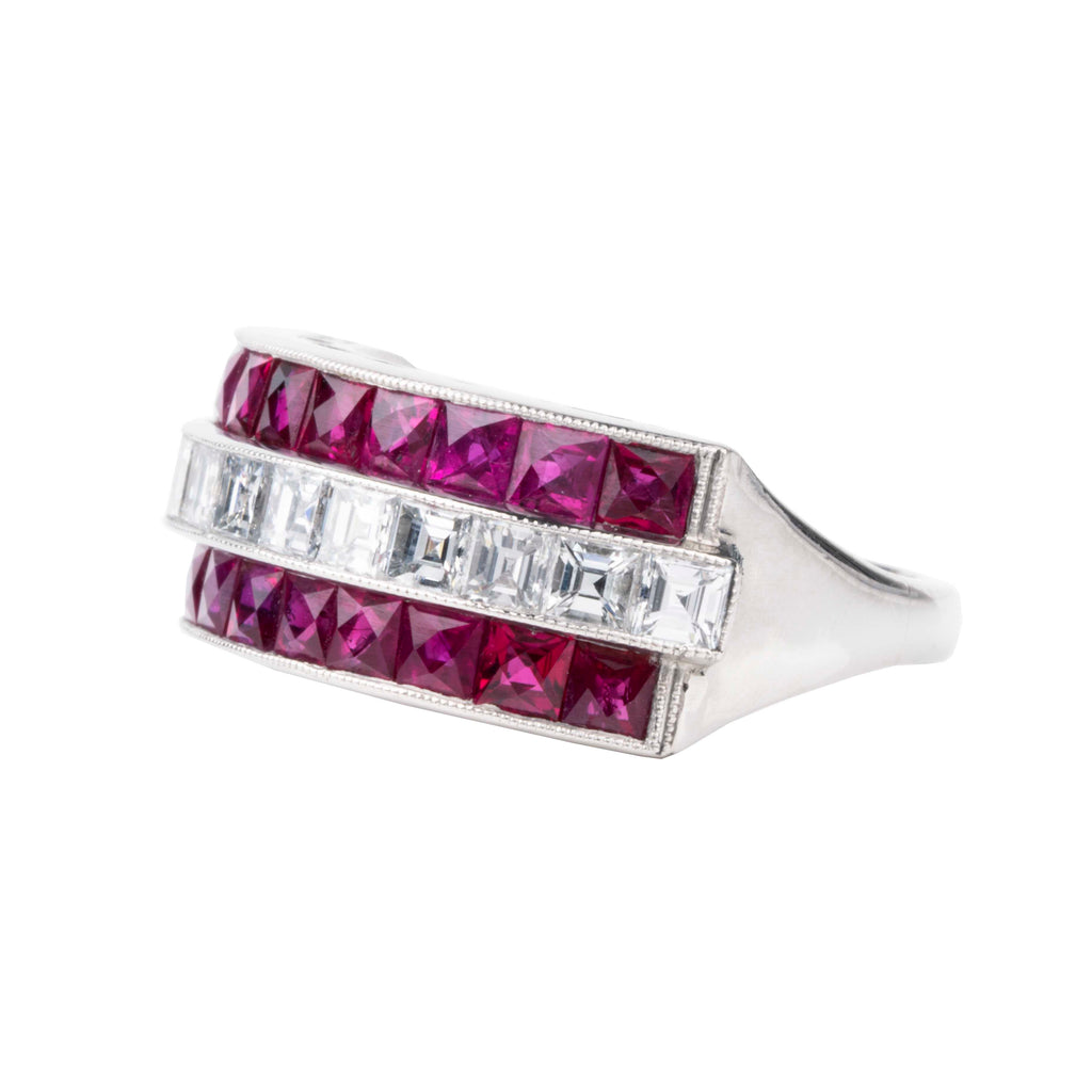Art Deco style vintage ruby and diamond ring, in platinum setting. Approximately 3.26 carats of bright red French cut rubies and 1.26 carats of French cut diamonds. Side view. 