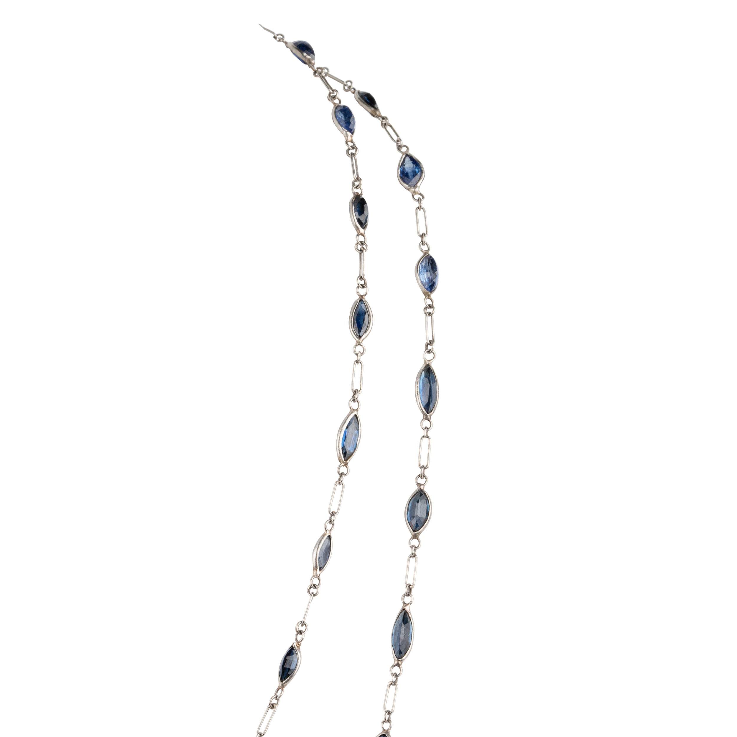 Art Deco sapphire spectacle set platinum chain. Marquise shaped blue sapphires set in bezel settings. American. Circa 1920.