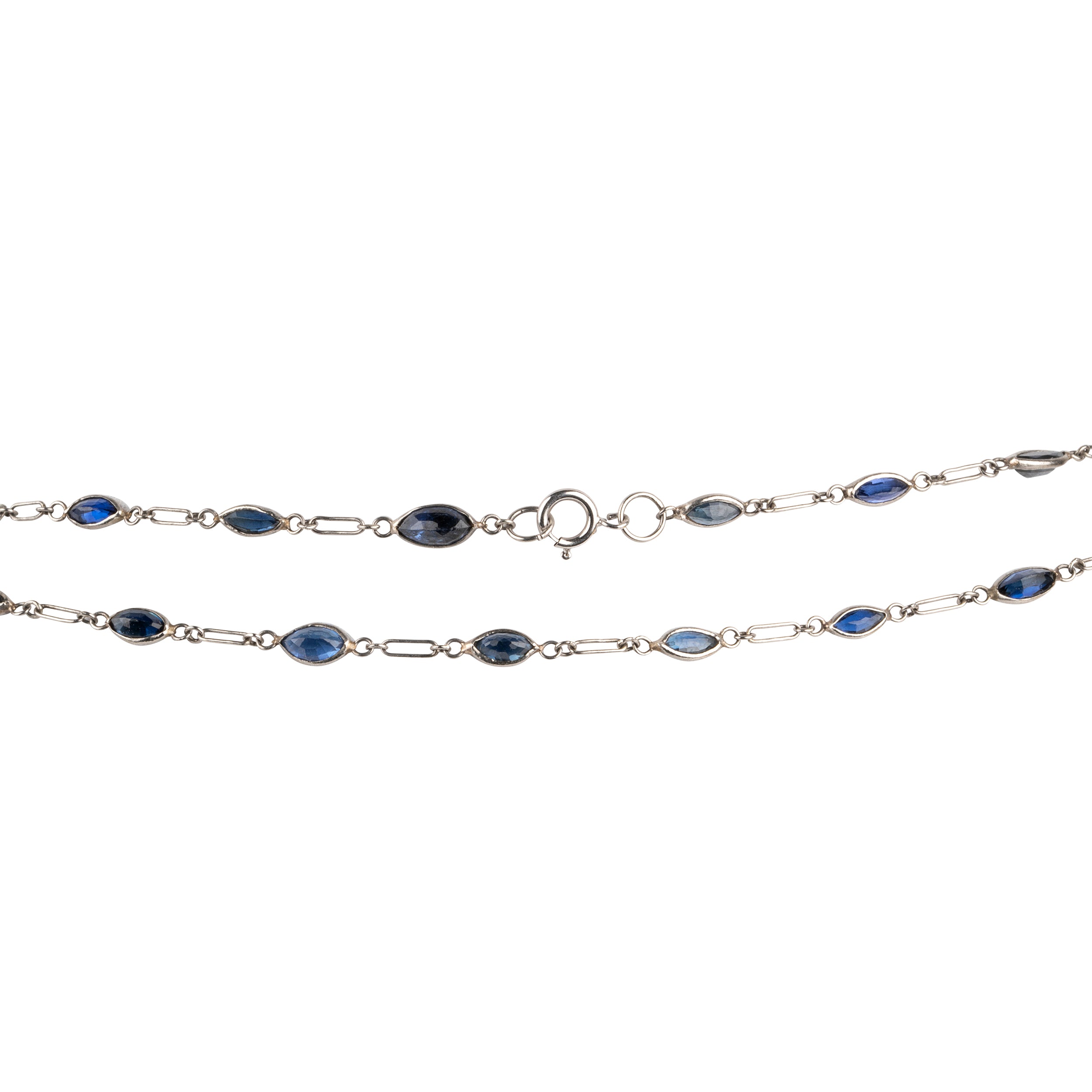 Art Deco sapphire spectacle set platinum chain. Marquise shaped blue sapphires set in bezel settings. American. Circa 1920.