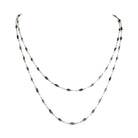 Art Deco sapphire spectacle set platinum chain. Marquise shaped blue sapphires set in bezel settings. American. Circa 1920.