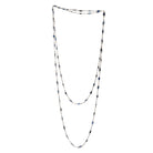 Art Deco sapphire spectacle set platinum chain. Marquise shaped blue sapphires set in bezel settings. American. Circa 1920.