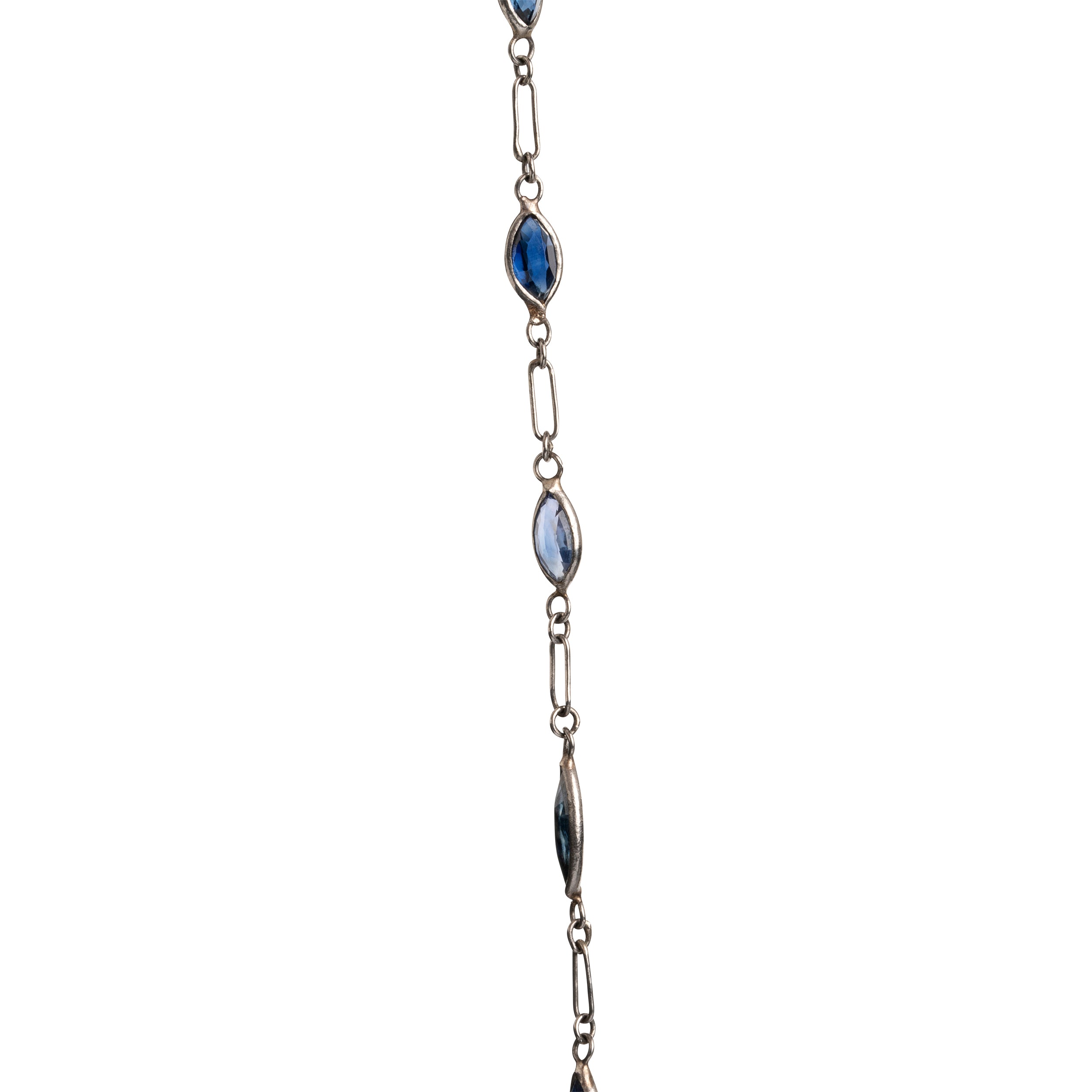 Art Deco sapphire spectacle set platinum chain. Marquise shaped blue sapphires set in bezel settings. American. Circa 1920.