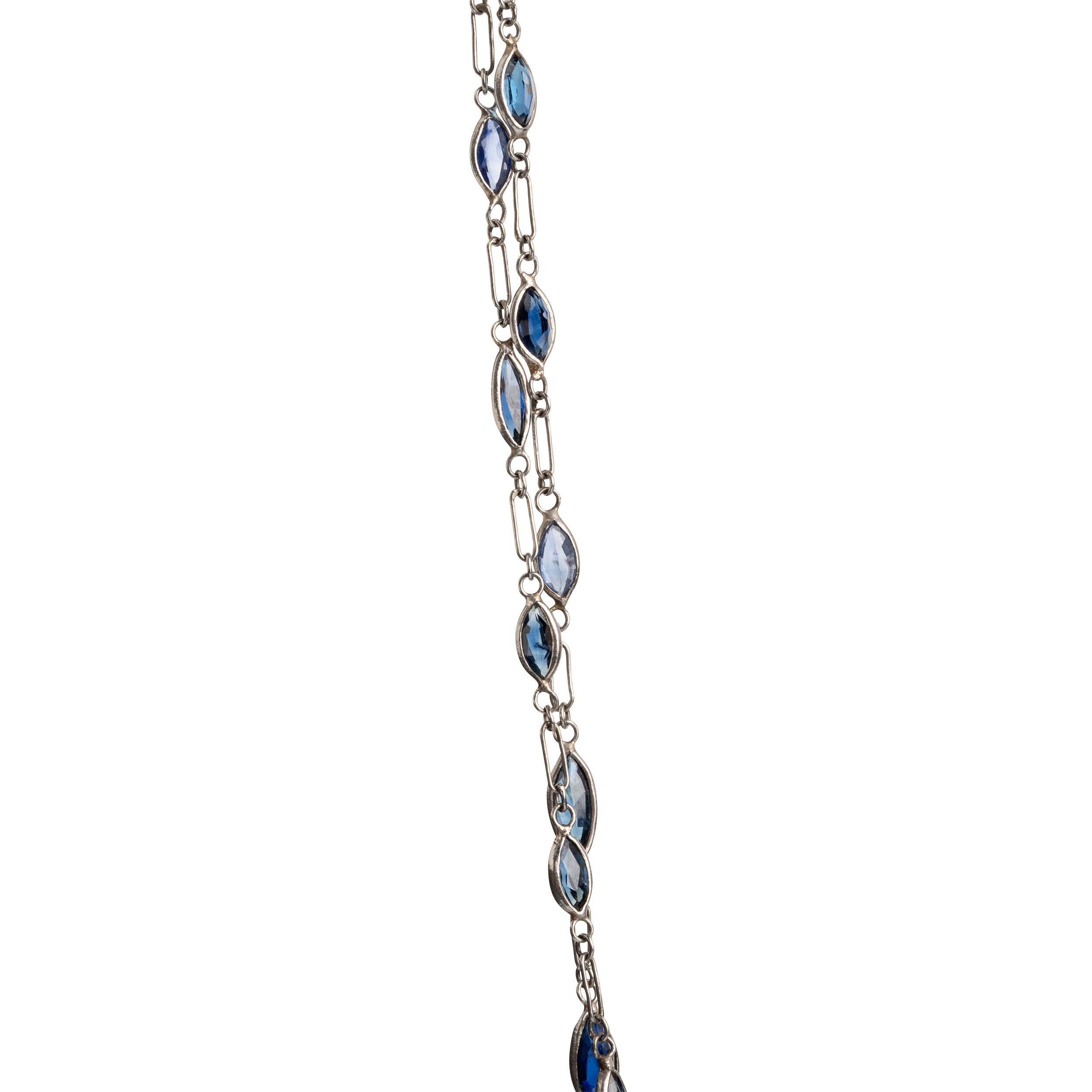 Art Deco sapphire spectacle set platinum chain. Marquise shaped blue sapphires set in bezel settings. American. Circa 1920.