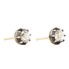 Our design for these earrings is inspired by Georgian and Victorian Era cutaway settings. Entirely hand fabricated they feature silver topped gold cutaway collet settings. This is a labor-intensive setting technique common in 18th and 19th century. These demure earrings feature two old mine cut diamonds, approximately 1.06 carats in total diamond weight , H-I color and SI1 / SI2 clarity. Hand engrave Bell &amp; Bird markers mark. Side view. 