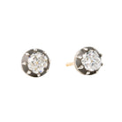 Our design for these earrings is inspired by Georgian and Victorian Era cutaway settings. Entirely hand fabricated they feature silver topped gold cutaway collet settings. This is a labor-intensive setting technique common in 18th and 19th century. These demure earrings feature two old mine cut diamonds, approximately 1.06 carats in total diamond weight , H-I color and SI1 / SI2 clarity. Hand engrave Bell &amp; Bird markers mark. Side view. 