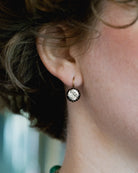 Georgian era bright white paste earrings. The paste stones are set in foiled-back silver settings on 18k gold wires. What were once beautiful Georgian era buttons or cufflinks are now perfect everyday earrings.