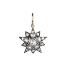 A lovely example of a 19th-century star pendant in silver-topped gold. It is a smaller scale than typically seen and very wearable. Sixteen bright old mine cut diamonds, with an estimated total diamond weight of two carats, English in origin. Circa 1880. Front view. 