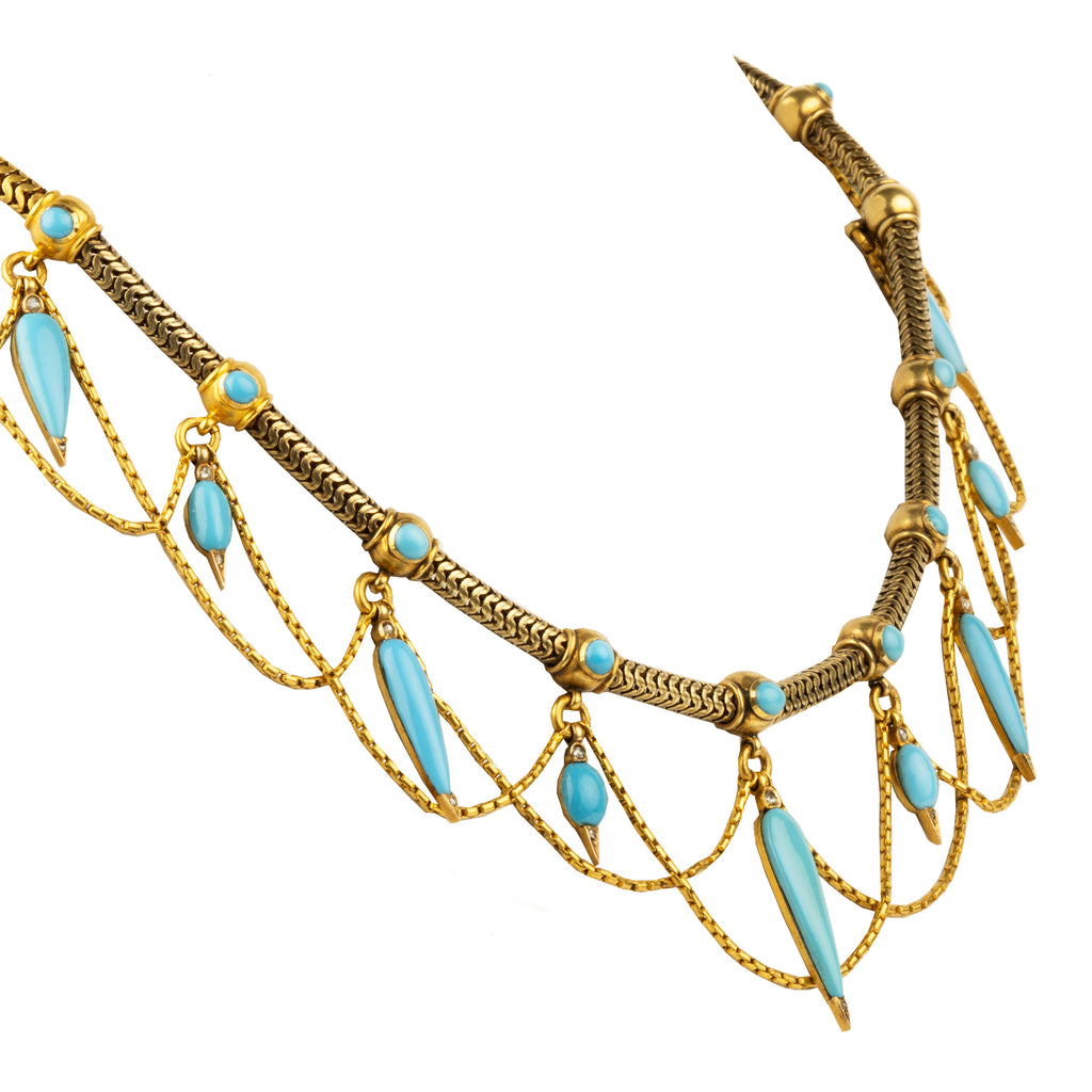 This is a rare example of an elaborate 19th-century collar necklace. Natural Persian turquoise stones are cut in the shapes of amphoras, with rose-cut diamonds set at the sharp tip of every setting. The necklace is made of 18k gold and was made in England, circa 1860. Side view. 