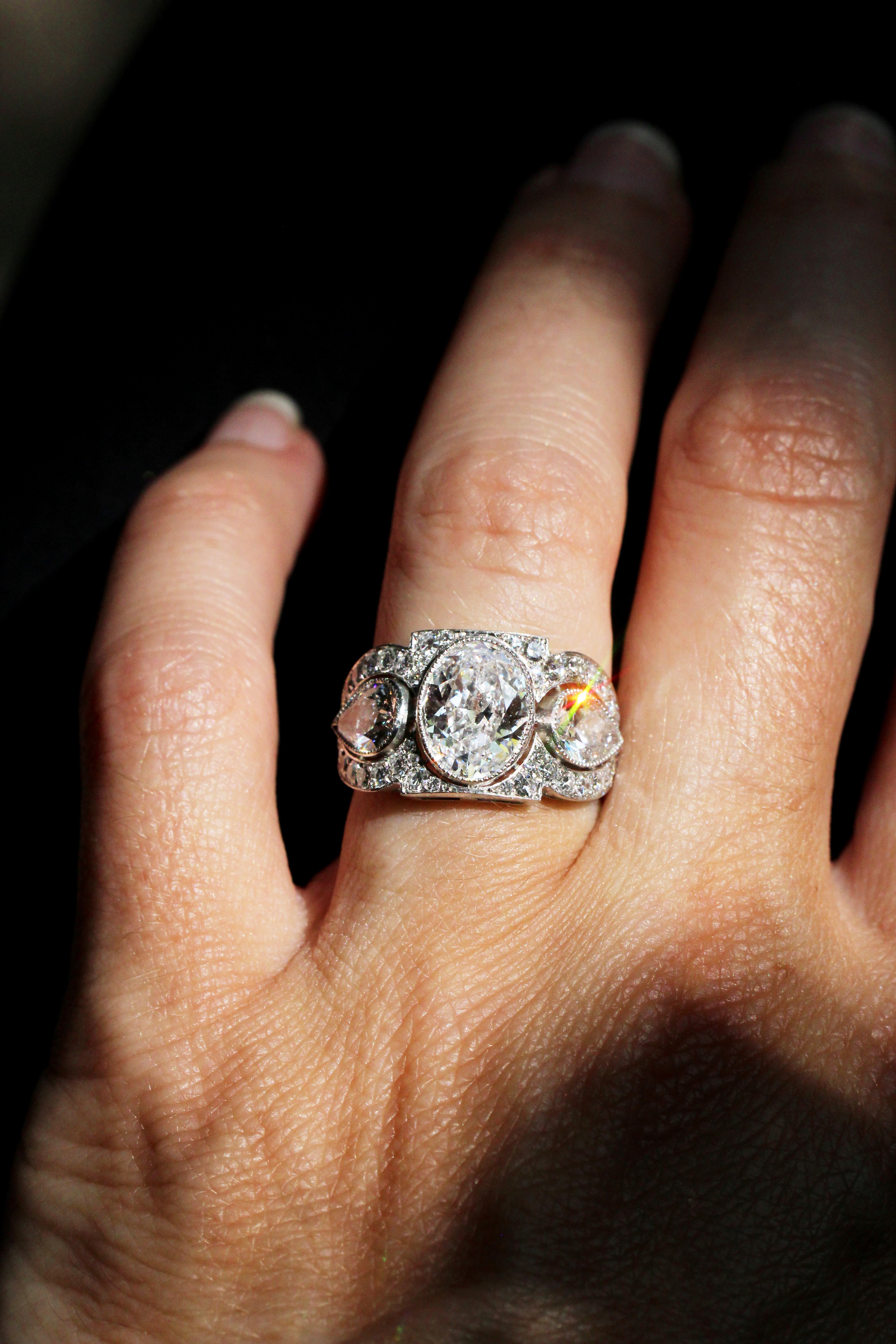 Art Deco Inspired Three Stone Diamond Ring with Oval and Pear