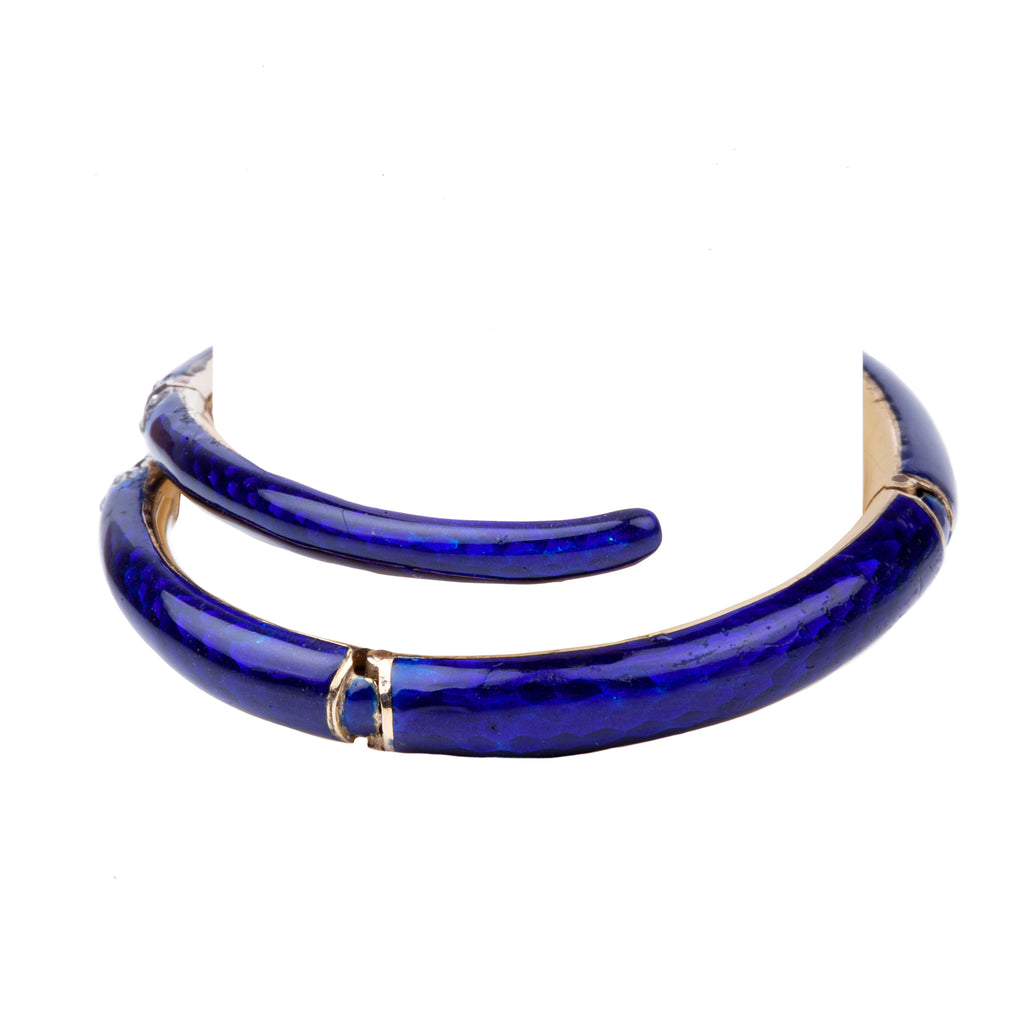 19th century snake bangle, set with both old mine cut and rose cut diamonds.ruby eyes. The body is crafted in 18k gold and hinged at 4 points allowing for a varied fit. English in origin. Circa 1860. Back side. 