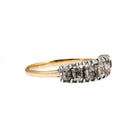 Georgian Era Table cut diamond half hoop band. 7 Table cut diamonds set in a silver closed back setting on a gold band. English in origin, found in London. Circa 1810. Side profile view.